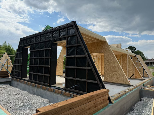 Maison-en-A-fabricant-Guillaumie-Construction-Bois Maison en forme de A